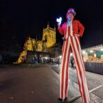 christmas stilt walker