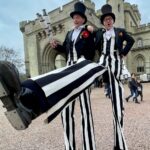 stilt walkers, double act